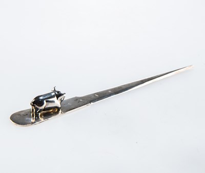 Lot 1126 - A SILVER PIG LETTER OPENER