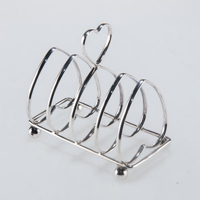 Lot 1170 - AN EDWARDIAN SILVER TOAST RACK