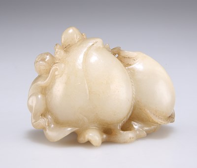 Lot 3023 - A CHINESE JADE CARVING OF PEACHES AND A MONKEY