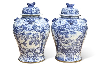 Lot 102 - A LARGE PAIR OF BLUE AND WHITE PORCELAIN VASES AND COVERS