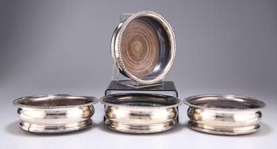 Lot 1011 - † FOUR OLD SHEFFIELD SILVER PLATE WINE COASTERS