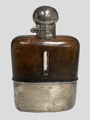 Lot 1036 - A GEORGE V SILVER-MOUNTED SPIRIT FLASK
