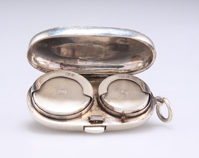 Lot 1255 - AN EDWARDIAN SILVER FULL AND HALF SOVEREIGN CASE