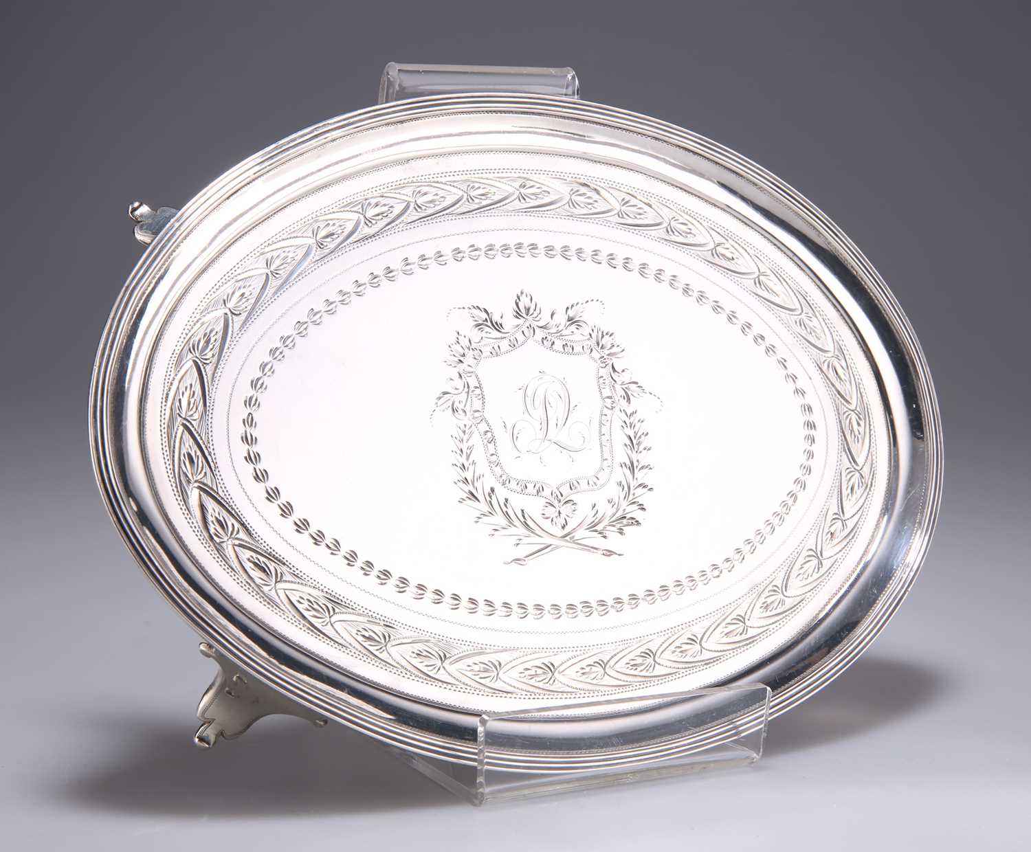 Lot 1121 - A GEORGE III SILVER TEAPOT STAND