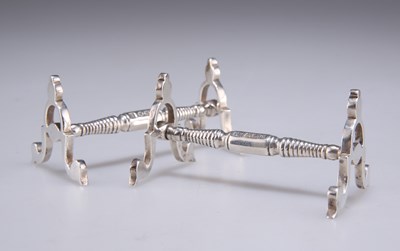 Lot 1232 - A PAIR OF GEORGE VI SILVER KNIFE RESTS