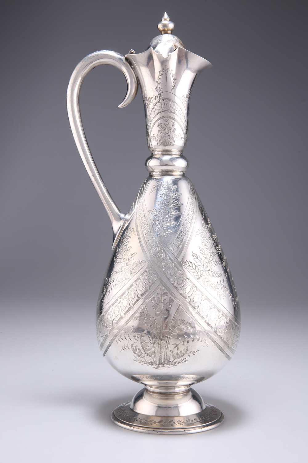 Lot 1026 - A VICTORIAN SILVER EWER