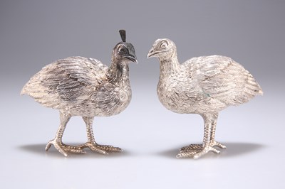 Lot 1066 - A PAIR OF SILVER MODELS OF BIRDS