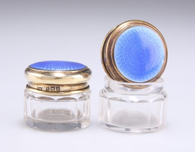 Lot 1361 - A PAIR OF GEORGE V SILVER AND BLUE ENAMEL JARS