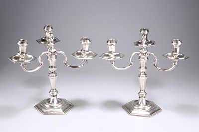 Lot 1258 - A PAIR OF GEORGIAN-STYLE CAST SILVER CANDELABRA