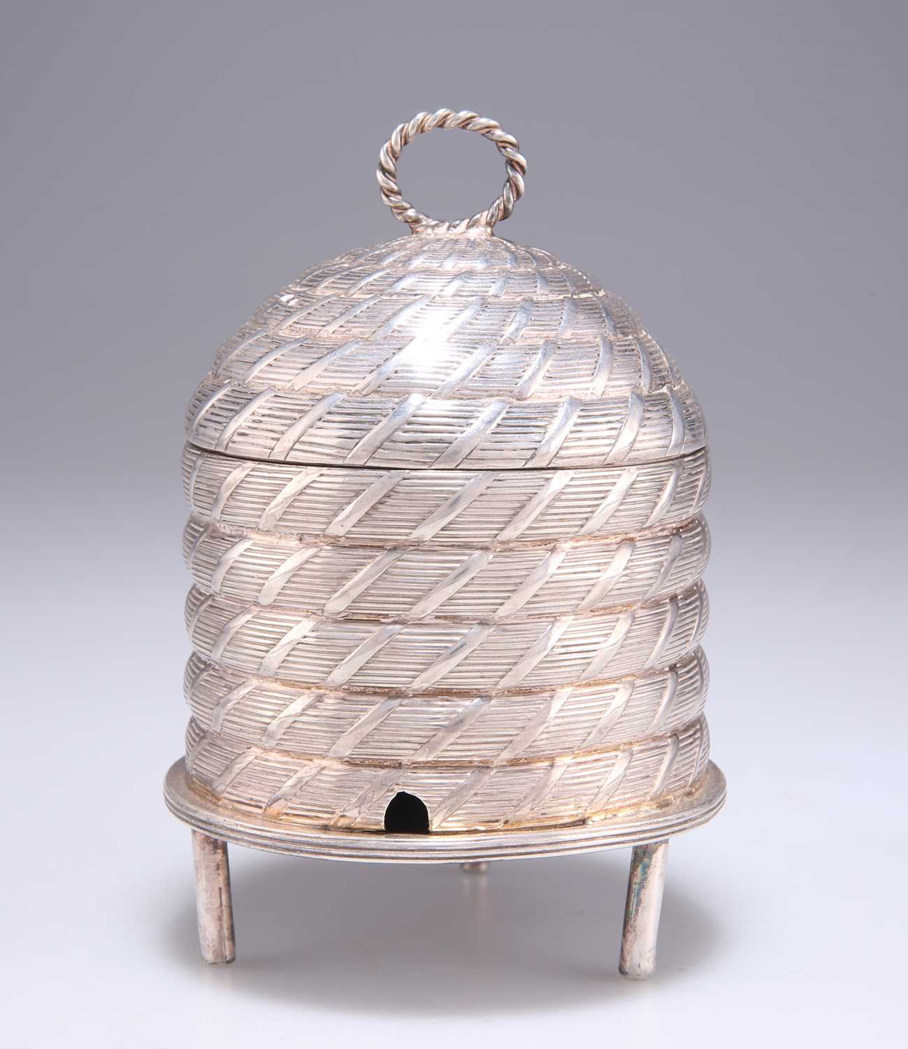 Lot 1346 - A GEORGE III SILVER BEEHIVE HONEY POT