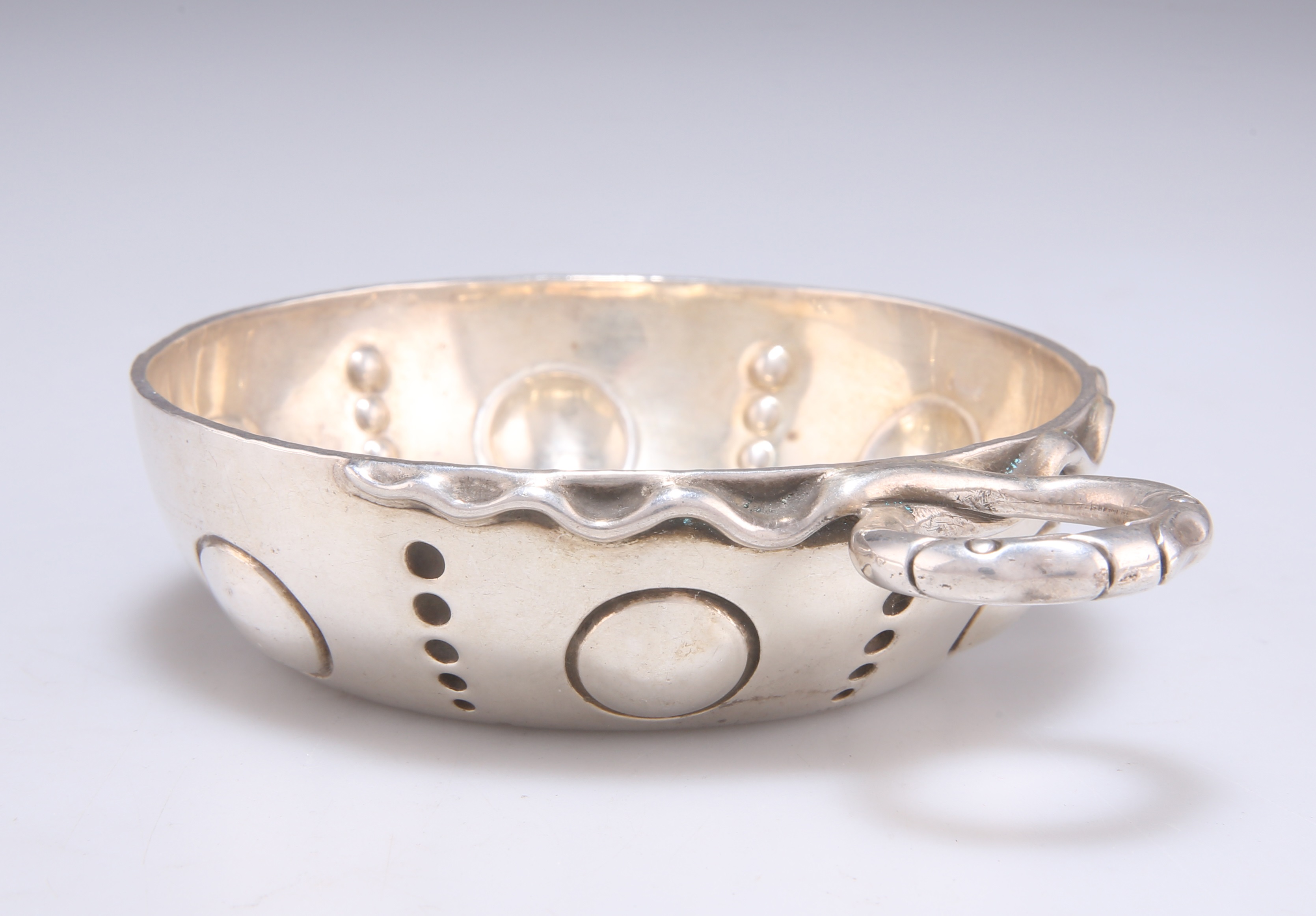 Lot 1317 - AN 18TH CENTURY STYLE SILVER TASTEVIN