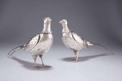 Lot 1012 - A PAIR OF GERMAN SILVER PHEASANT PEPPERS, CIRCA 1890
