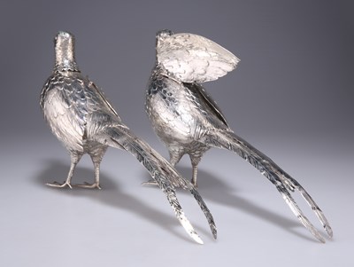 Lot 1012 - A PAIR OF GERMAN SILVER PHEASANT PEPPERS, CIRCA 1890
