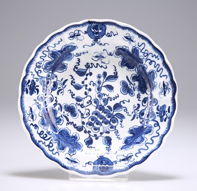 Lot 107 - A BOW BLUE AND WHITE DESSERT PLATE, CIRCA 1760