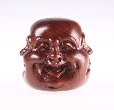 Lot 3049 - A JAPANESE CHERRYWOOD CARVING OF A THREE-FACED BUDDHA