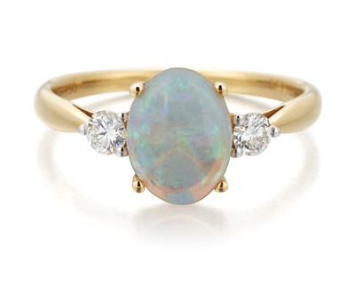 Lot 2123 - AN 18 CARAT GOLD OPAL AND DIAMOND THREE STONE RING