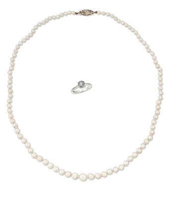 Lot 2220 - AN 18 CARAT WHITE GOLD SOLITAIRE IOLITE RING, AND A CULTURED PEARL NECKLACE