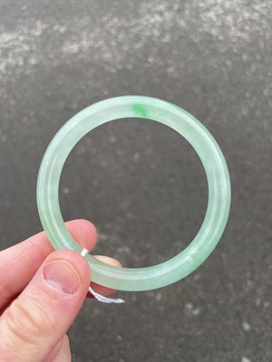 Lot 3150 - A JADE BANGLE