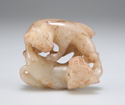 Lot 3061 - A CARVED JADE GROUP