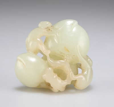 Lot 3100 - A CARVED JADE GROUP