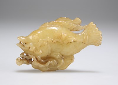 Lot 1047 - A CARVED JADE FISH GROUP