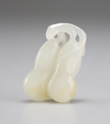 Lot 3027 - A CARVED JADE GROUP