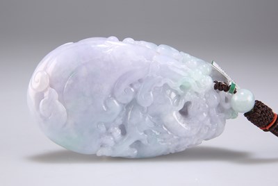 Lot 3057 - A CHINESE CARVED SMALL WHITE JADE 'DRAGON' BOULDER