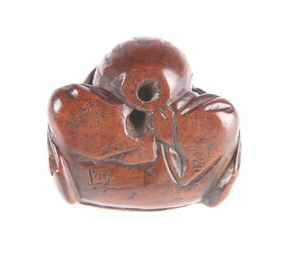 Lot 3044 - A JAPANESE WOODEN NETSUKE