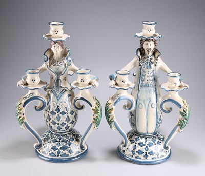 Lot 71 - A PAIR OF CONTINENTAL FAÏENCE FIGURAL CANDELABRA, CIRCA 1900