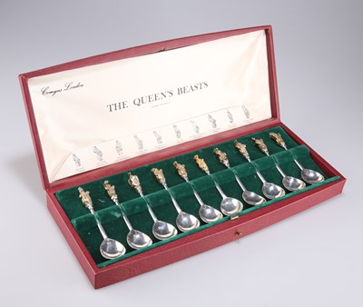 Lot 1152 - ROYAL INTEREST: A SET OF TEN ELIZABETH II SILVER AND PARCEL-GILT SPOONS, "THE QUEEN'S BEASTS"