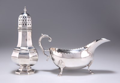 Lot 1394 - AN ELIZABETH II SILVER SUGAR CASTER, AND AN IRISH SILVER SAUCEBOAT