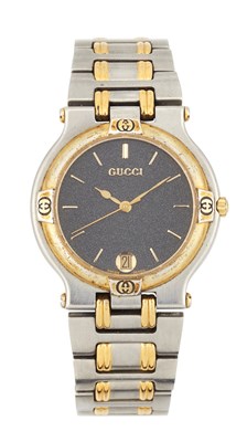 Lot 2156 - A LADY'S BI-COLOUR GUCCI 9000 BRACELET WATCH