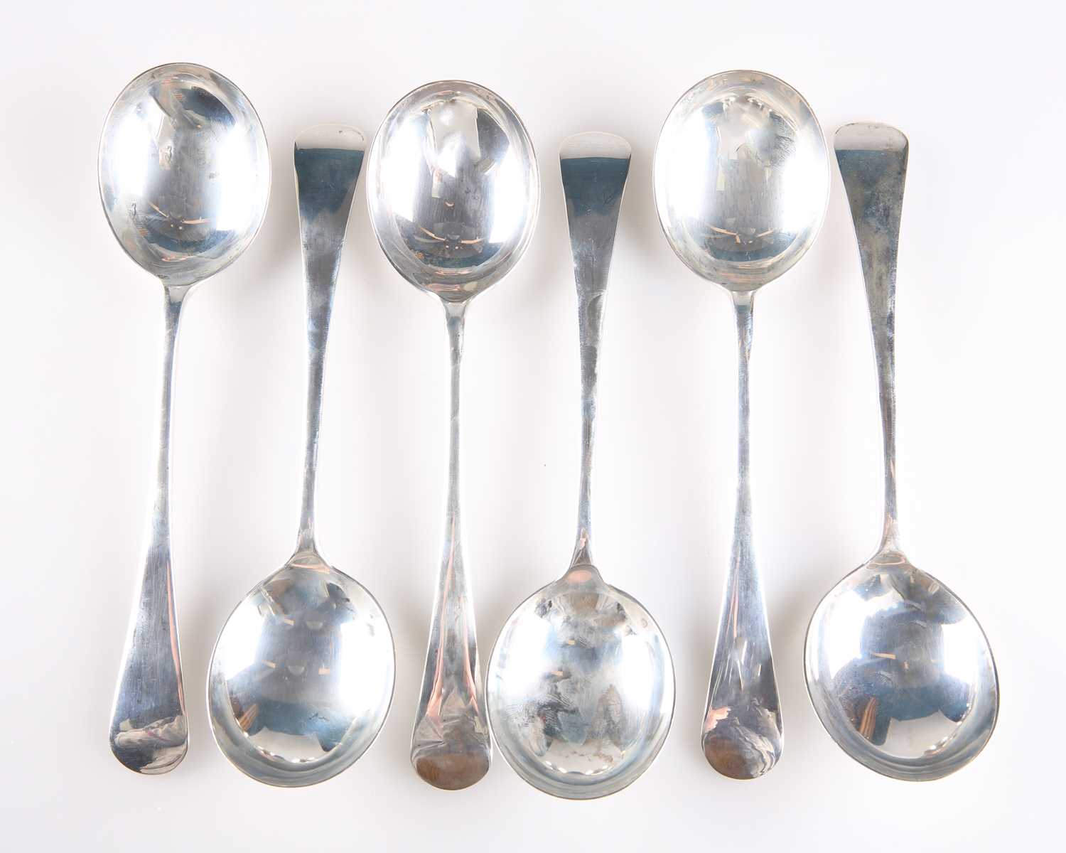Lot 1043 A SET OF SIX V SILVER SOUP SPOONS