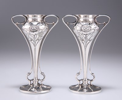 Lot 1061 - A PAIR OF ART NOUVEAU TWIN-HANDLED POSY VASES