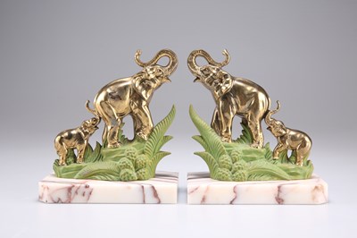 Lot 308 - A PAIR OF ART DECO BRASS AND PAINTED 'ELEPHANT' BOOKENDS