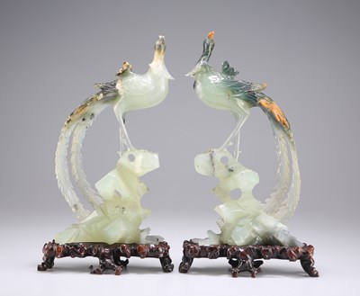 Lot 277 - A PAIR OF 20TH CENTURY CHINESE CARVED SERPENTINE PHOENIXES