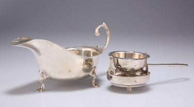 Lot 188 - A GEORGE V SILVER SAUCE BOAT, AND A FOREIGN SILVER TEA STRAINER