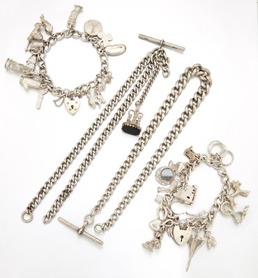 Lot 2008 - TWO SILVER CHARM BRACELETS AND TWO SILVER ALBERT CHAINS