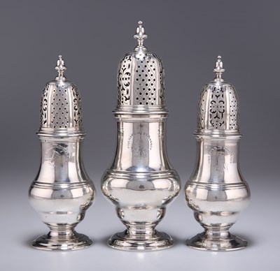 Lot 1104 - A GRADUATED SET OF THREE GEORGE II SCOTTISH SILVER CASTERS