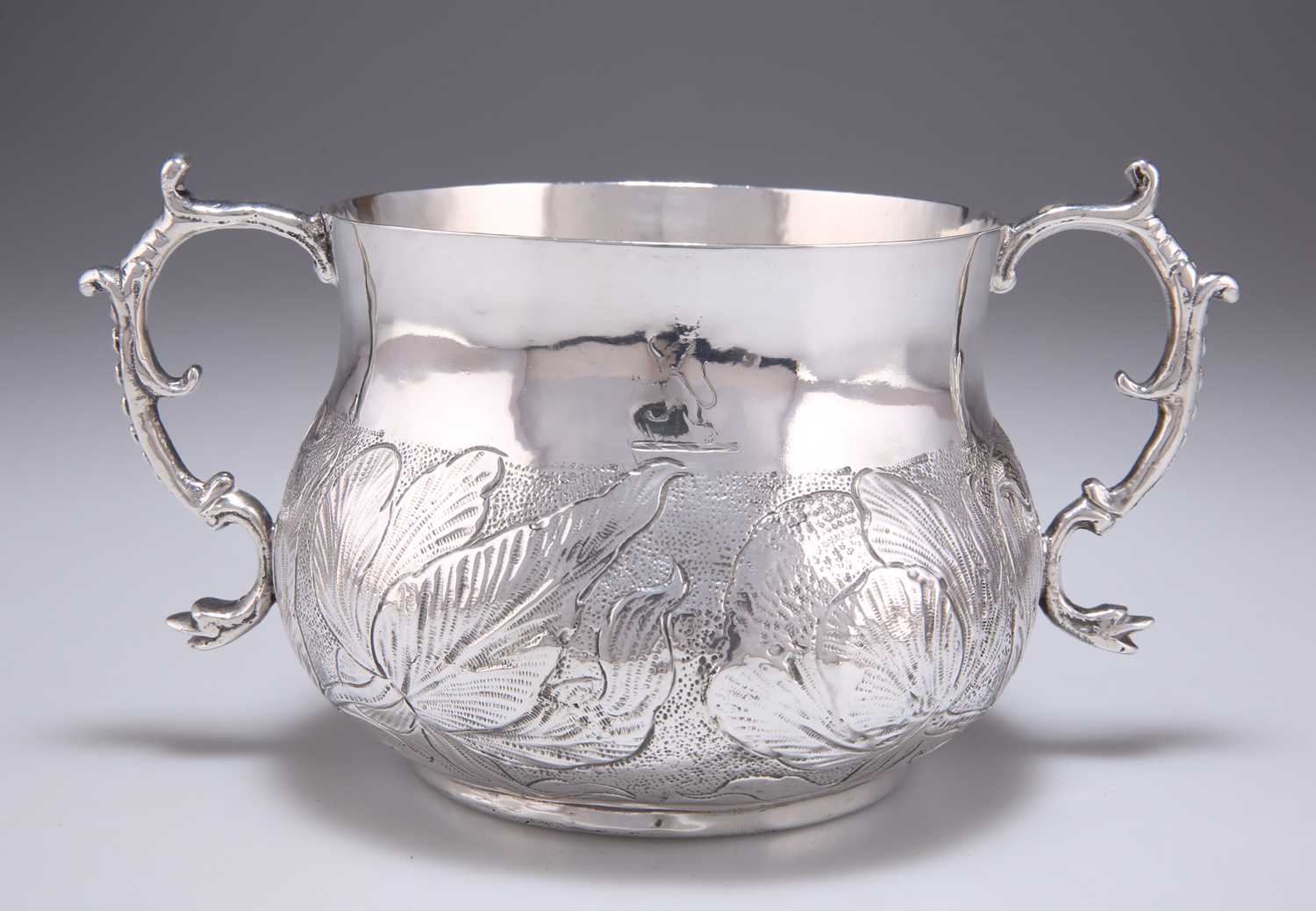 Lot 1116 - A CHARLES II SILVER PORRINGER