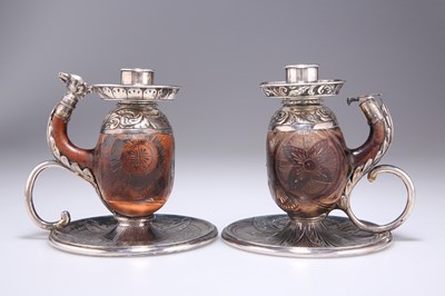 Lot 1012 - A STRIKING PAIR OF VICTORIAN SILVER-MOUNTED CHAMBERSTICKS