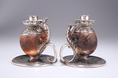 Lot 1012 - A STRIKING PAIR OF VICTORIAN SILVER-MOUNTED CHAMBERSTICKS