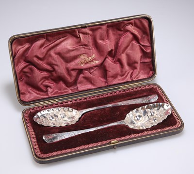 Lot 1205 - A PAIR OF GEORGE III SILVER BERRY SPOONS