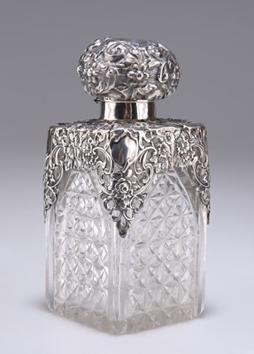 Lot 1200 - A VICTORIAN SILVER-MOUNTED LARGE CUT-GLASS SCENT BOTTLE