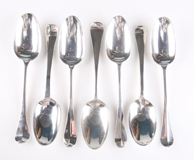 Lot 1038 - SEVEN SILVER HANOVERIAN PATTERN TABLESPOONS, 18TH CENTURY