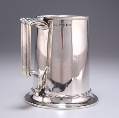 Lot 1015 - A VICTORIAN SILVER OVERSIZED MUG