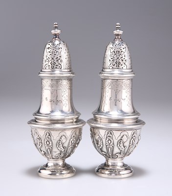 Lot 1099 - A PAIR OF VICTORIAN SILVER CASTERS