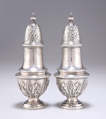 Lot 1099 - A PAIR OF VICTORIAN SILVER CASTERS