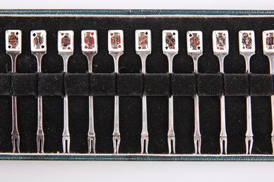 Lot 1440 - A SET OF TWELVE ELIZABETH II SILVER AND ENAMEL PICKLE FORKS