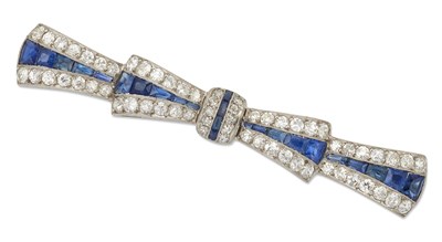 Lot 919 - A SAPPHIRE AND DIAMOND BOW BROOCH, CIRCA 1920S